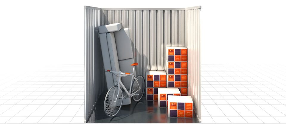 35 square foot storage unit with a sofa, bike, and boxes.